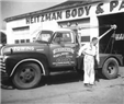 Tom Heitzman and the Heitzman tow truck, 1950.